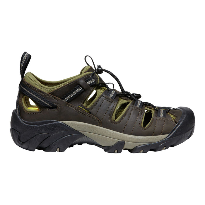 Brown hiking shoe/sandal with black sole on a white background