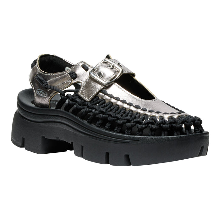 Black and silver sandal with thick sole on a white background