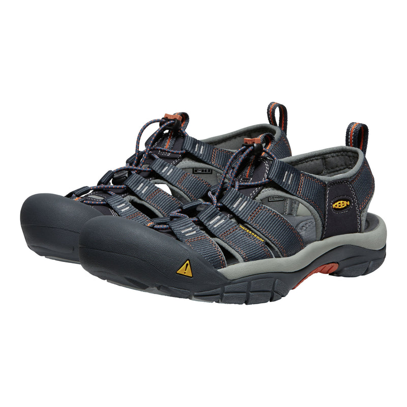 Pair of gray and black sandals with a visible brand logo on a white background