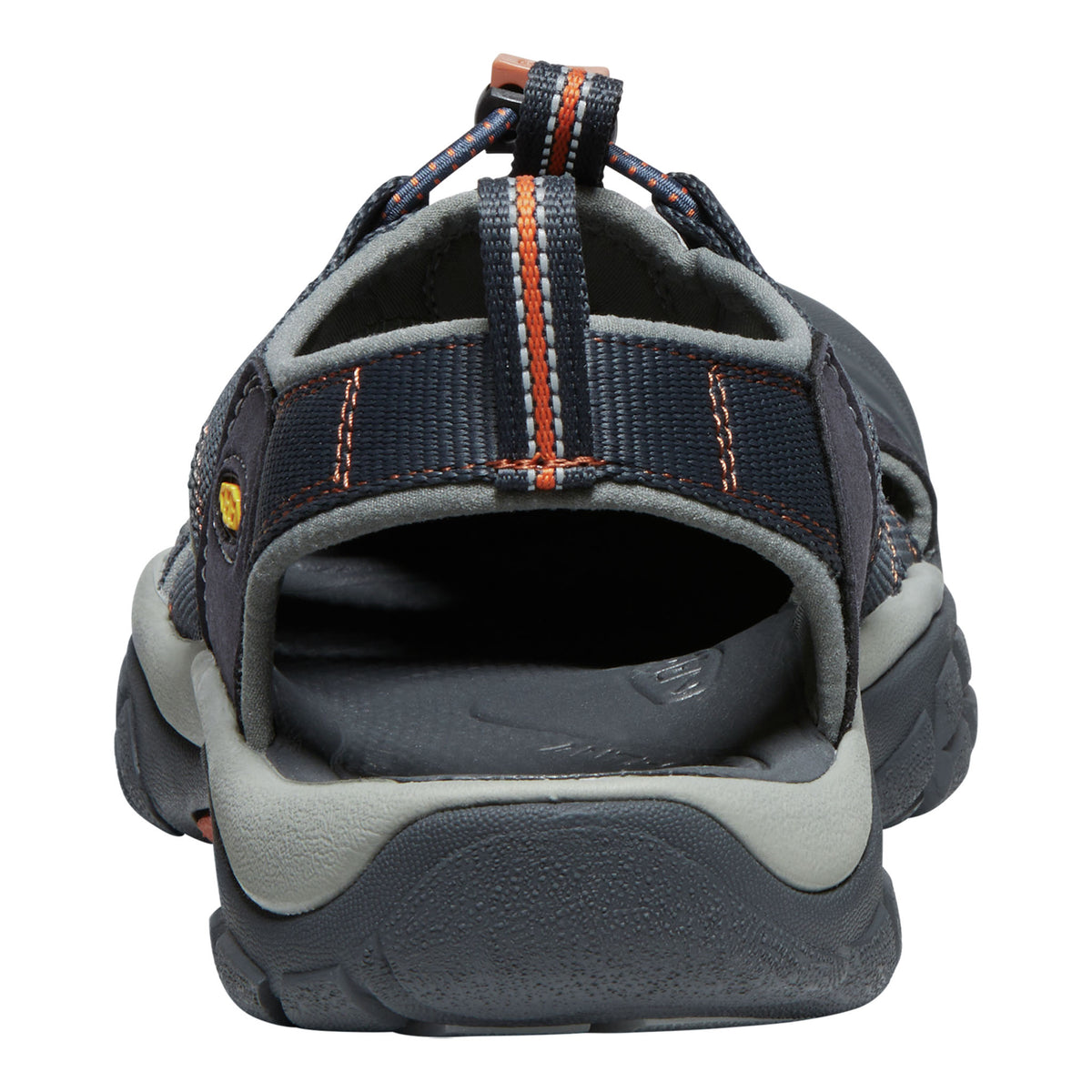 Back view of a blue sandal with orange accents on a white background