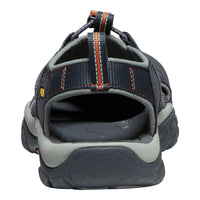 Back view of a blue sandal with orange accents on a white background