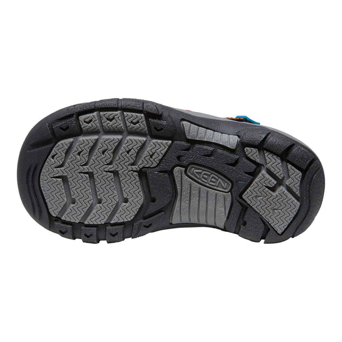 Close-up of a black and gray shoe sole with KEDS branding on a white background