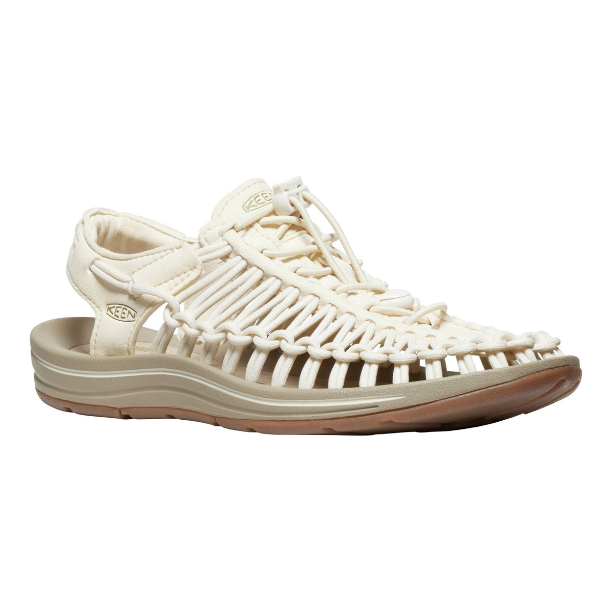 Beige sandal with woven design on a white background