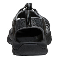 Black and gray sandal on a white background