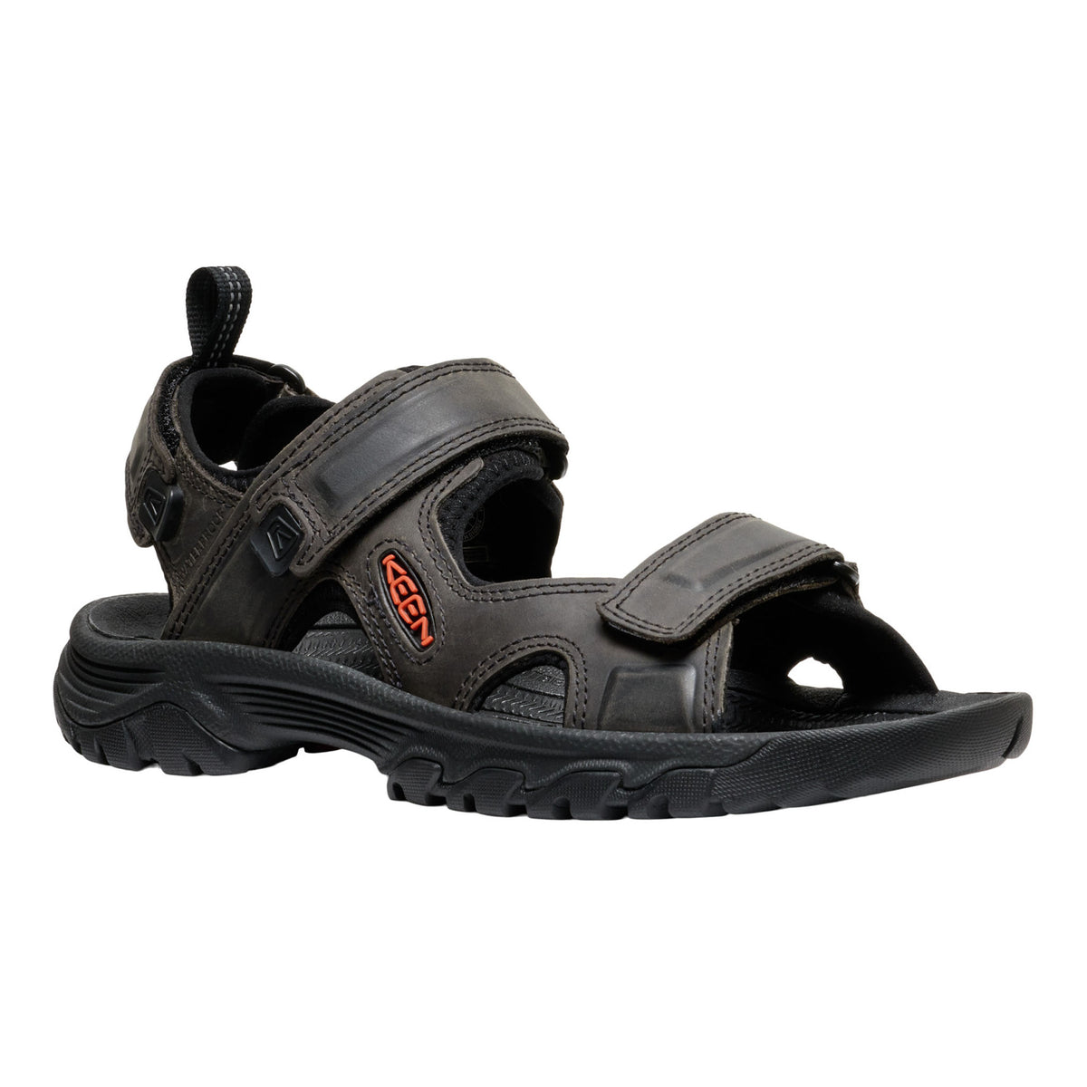 Black sandal with a visible brand logo on a white background
