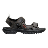 Black sandal with strap design on a white background
