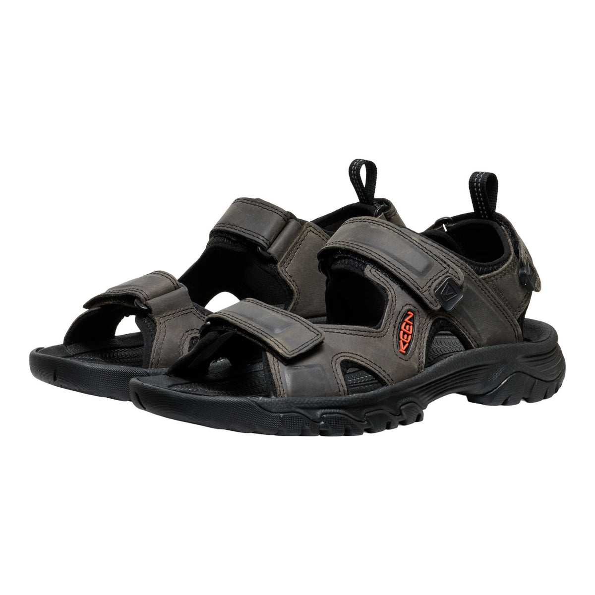 Pair of black Keen sandals on a white background