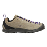 A Keen low-top hiking shoe in beige suede with black mesh panels, purple laces, and a dark gray sole, shown from a side profile on a white background.