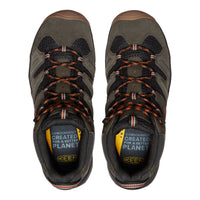Pair of Keen hiking shoes on a white background