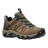 A Keen hiking shoe in brown suede and mesh with dark green accents, black laces, and a rugged black and gray sole, shown on a plain white background.