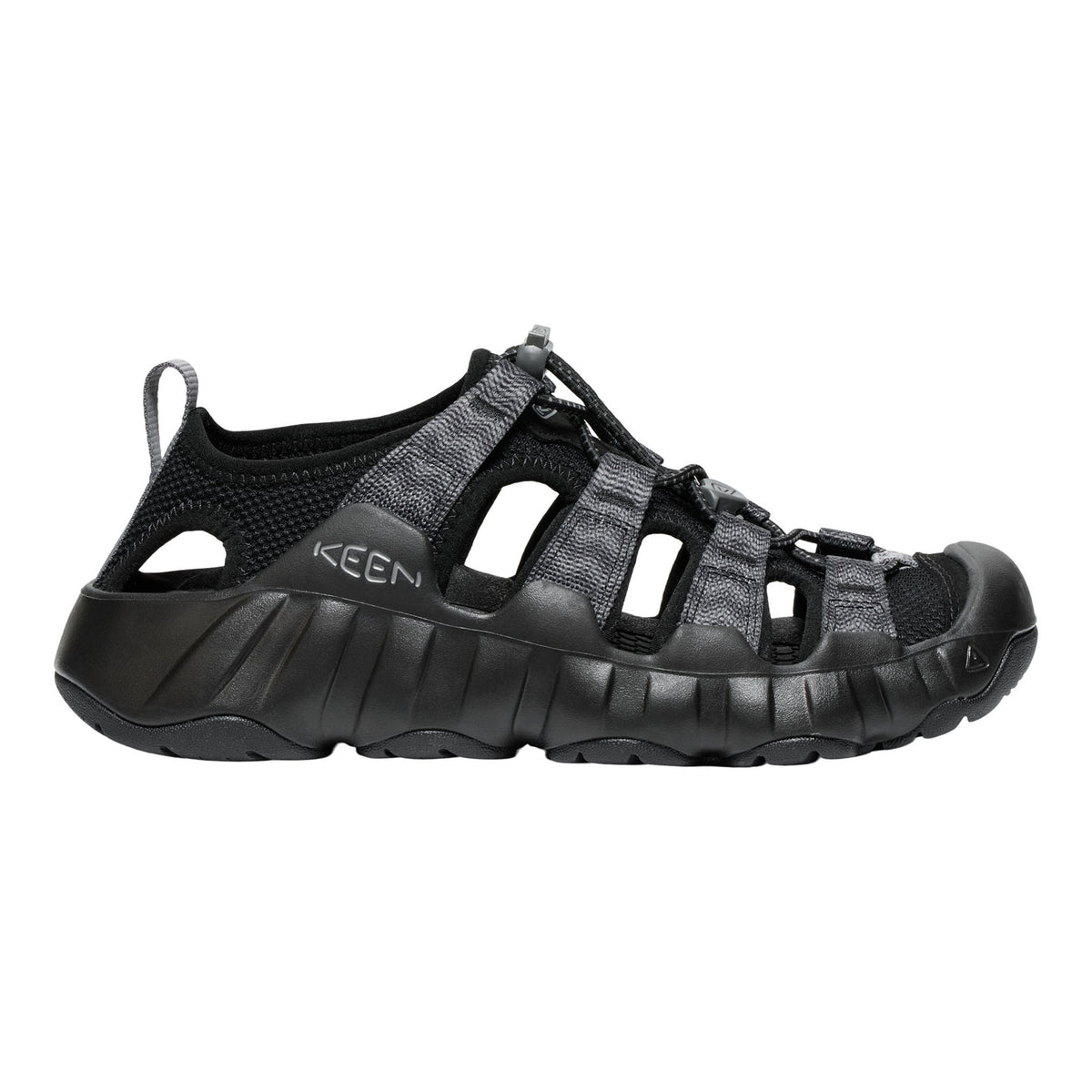 Black sandal with KEEN branding on a white background