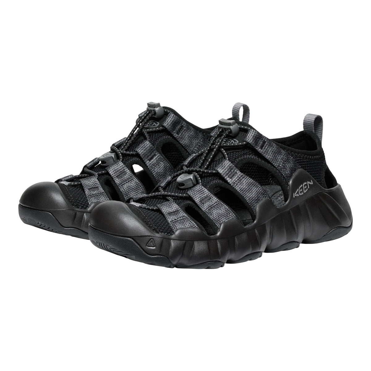 Black Keen sandals on a white background