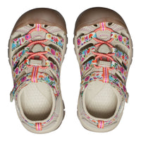 A pair of children's Keen sandals shown from a top-down view on a white background. The sandals feature a beige footbed and toe caps, brown rubber toe protectors, and colorful floral-patterned straps with pink laces.