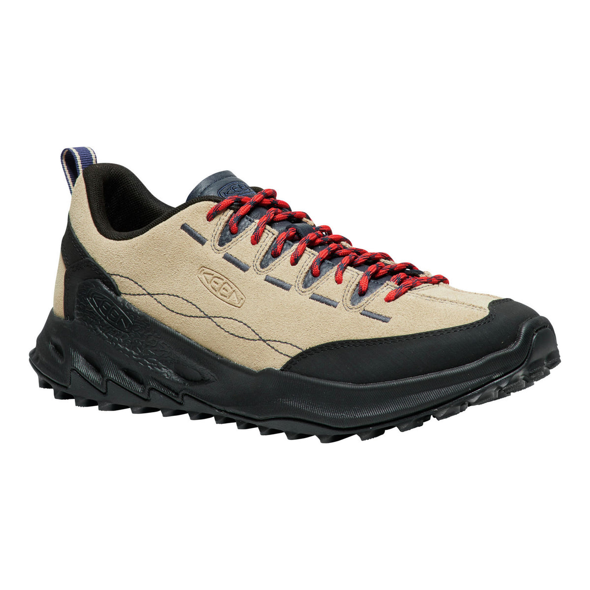 Beige and black hiking shoe with red laces on a white background