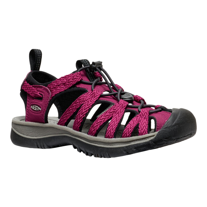 Pink and black sandal on a white background