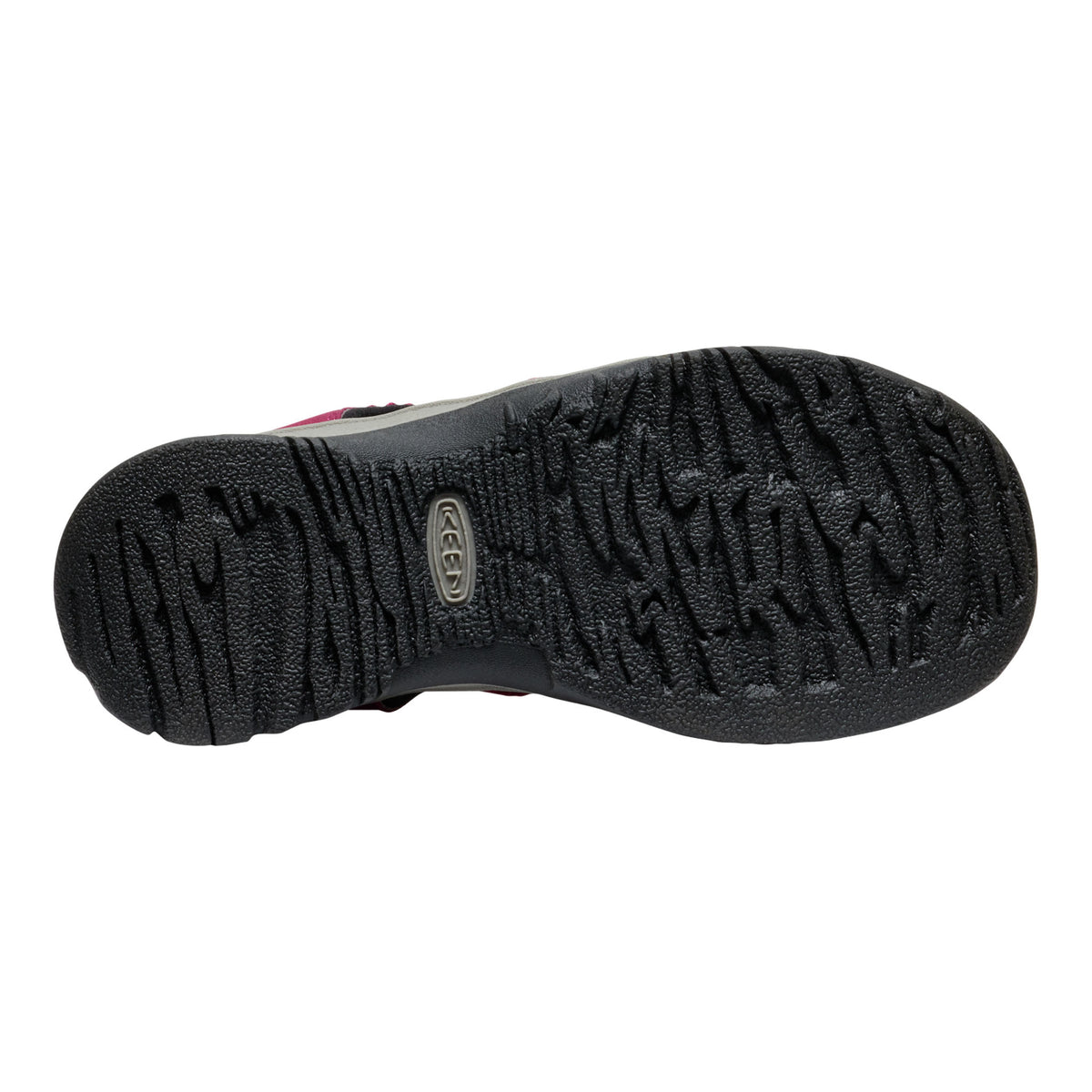 Black sole of a shoe with a brand logo on a white background