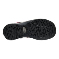 Black sole of a shoe with a brand logo on a white background