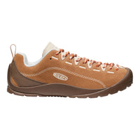 Brown sneaker with orange laces on a white background
