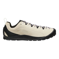 Beige and black sneaker on a white background