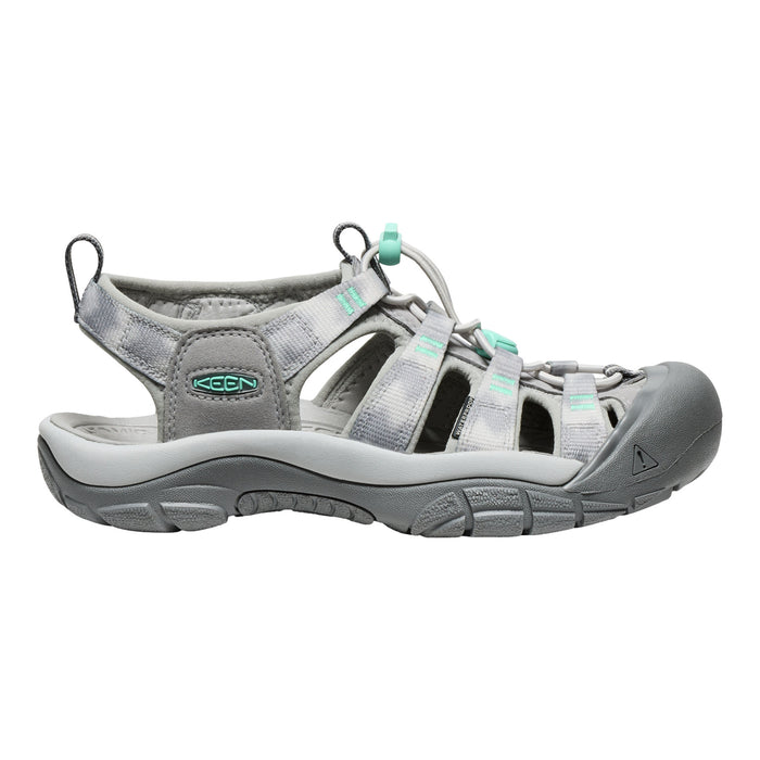 Gray sandal with teal accents on a white background