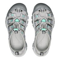 Pair of gray and teal sandals on a white background