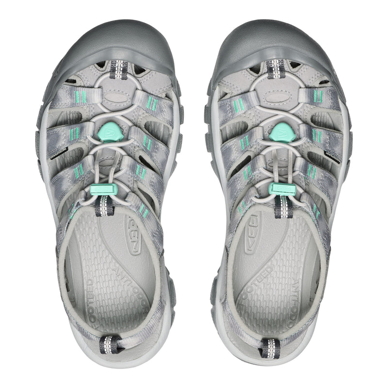 Pair of gray and teal sandals on a white background