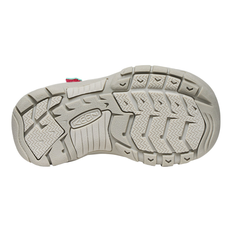 Close-up of a shoe sole with brand logo on a white background