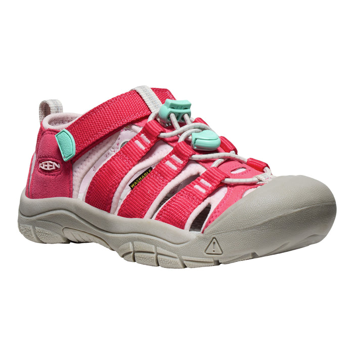 Pink sandal with green accents on a white background