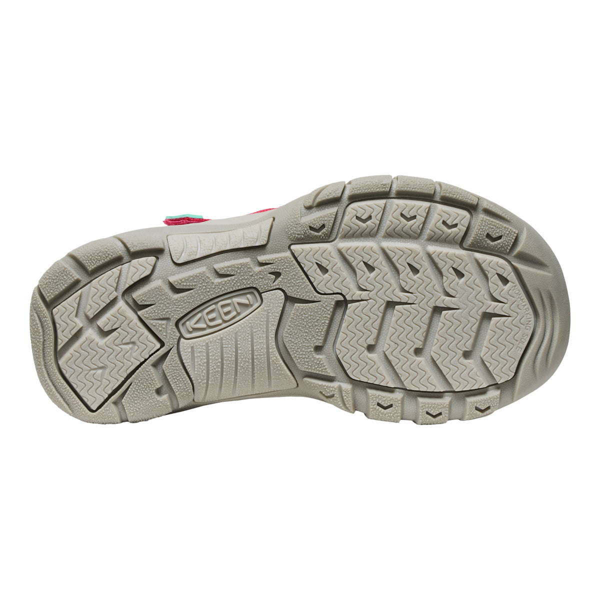 Close-up of a shoe sole with a brand logo on a white background