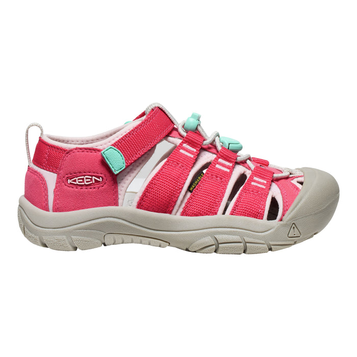 Pink sandal with green accents on a white background