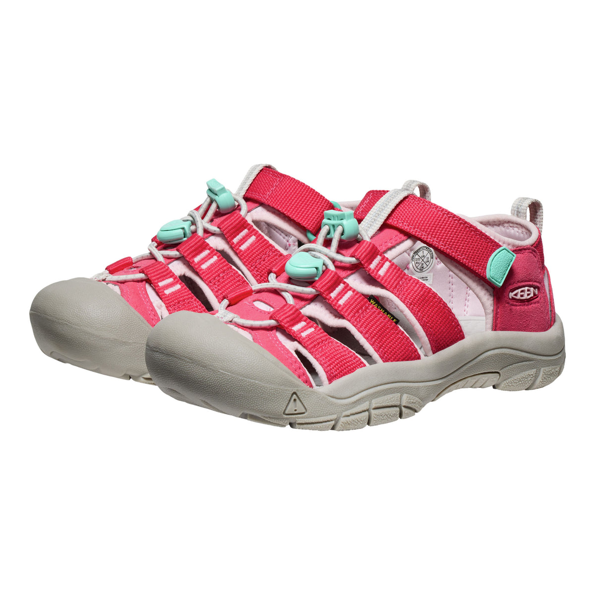 Pink and beige sandals with turquoise accents on a white background