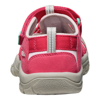 Pink sandal with gray sole on a white background
