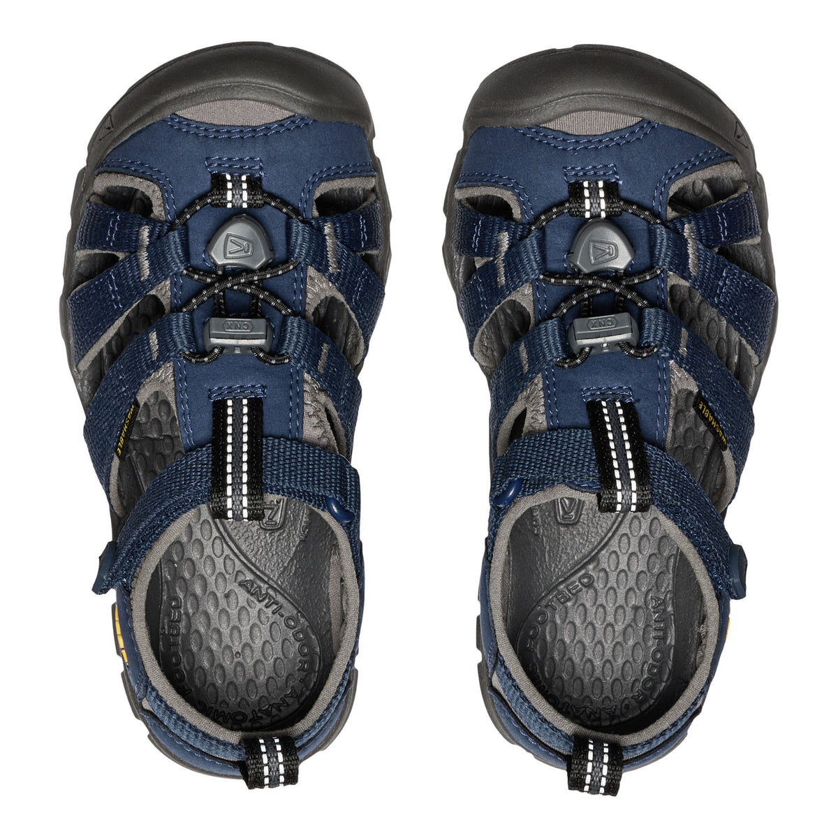 A pair of navy blue and gray Keppra kids' sandals shown from a top-down view on a white background.