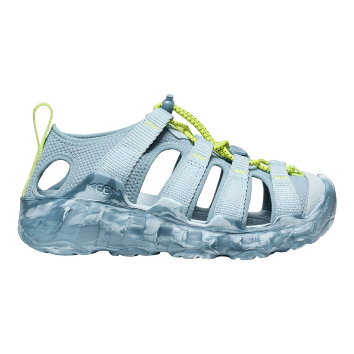 Light blue sandal with green accents on a white background