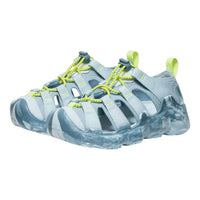 Light blue sandals with green accents on a white background