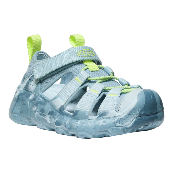 Blue children's sandal with clear sole and green straps on a white background