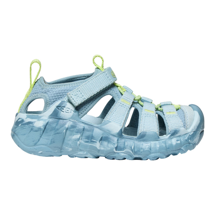 Light blue sandal with clear sole on a white background
