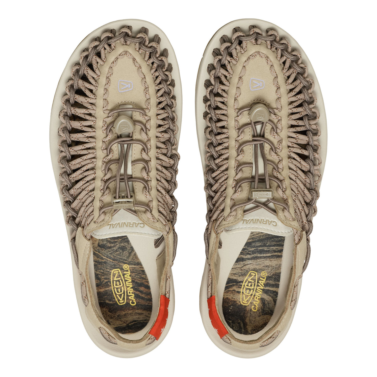 Pair of beige and brown sneakers with braided design on a white background
