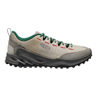 Beige and gray hiking shoe with green accents on a white background