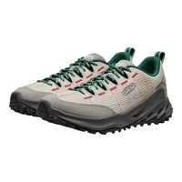 Pair of gray and green hiking shoes on a white background
