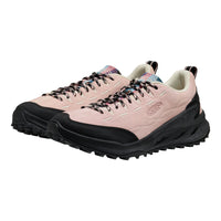 Pink hiking shoes with black soles on a white background
