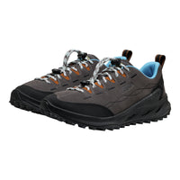 Pair of gray hiking shoes with black soles on a white background