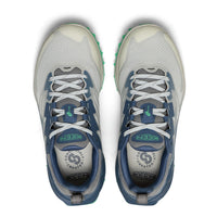 A pair of Keen brand athletic sneakers shown from a top-down view. The shoes feature a light gray mesh upper with slate blue overlays, white laces, and a small mint green accent on the outsole.