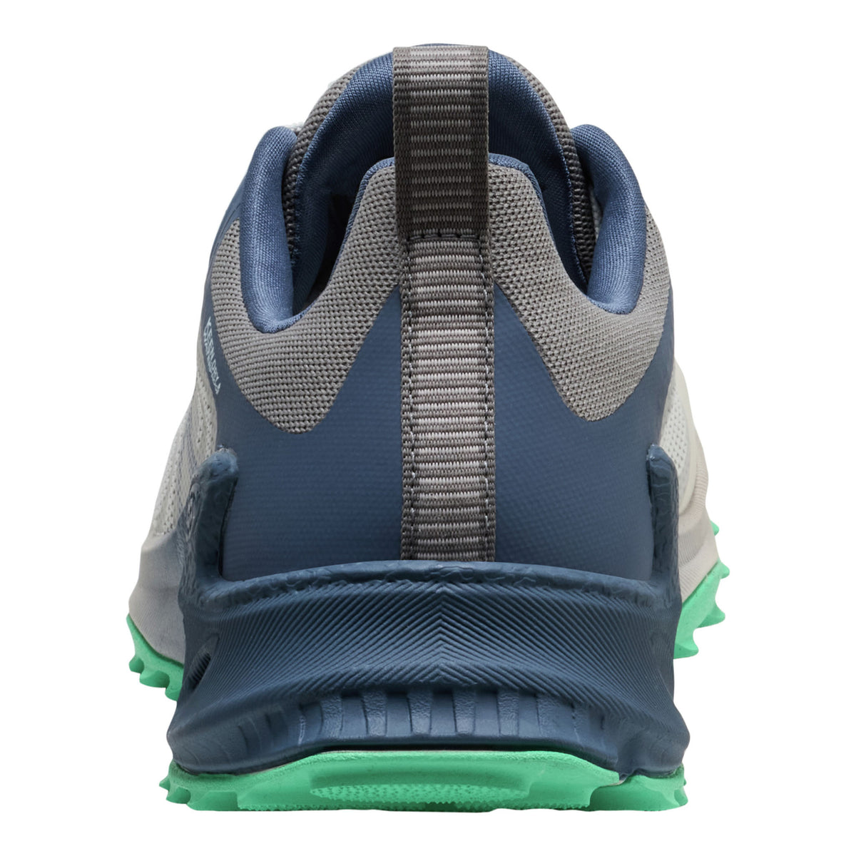 A close-up rear view of a trail running shoe in navy blue, gray, and light gray mesh, featuring a bright green outsole.