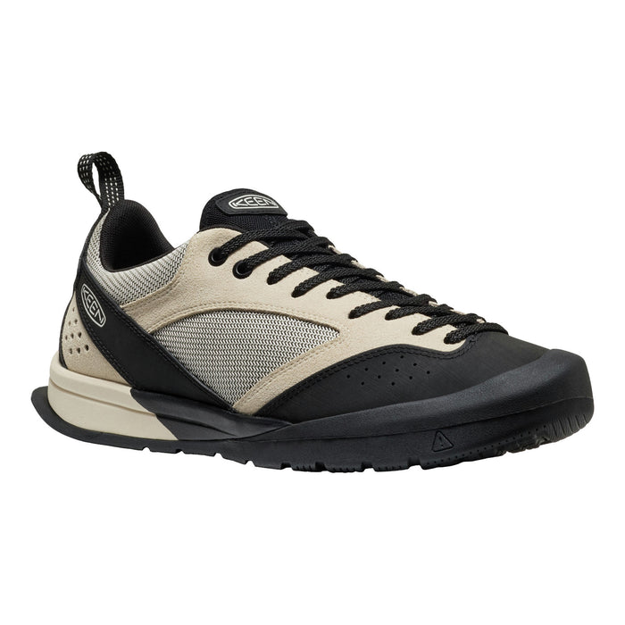 Black and beige sneaker on a white background