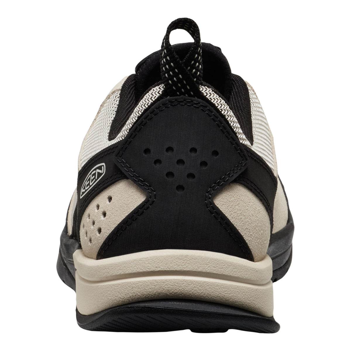 Black and beige athletic shoe on a white background