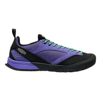 Purple and black sneaker with green laces on a white background