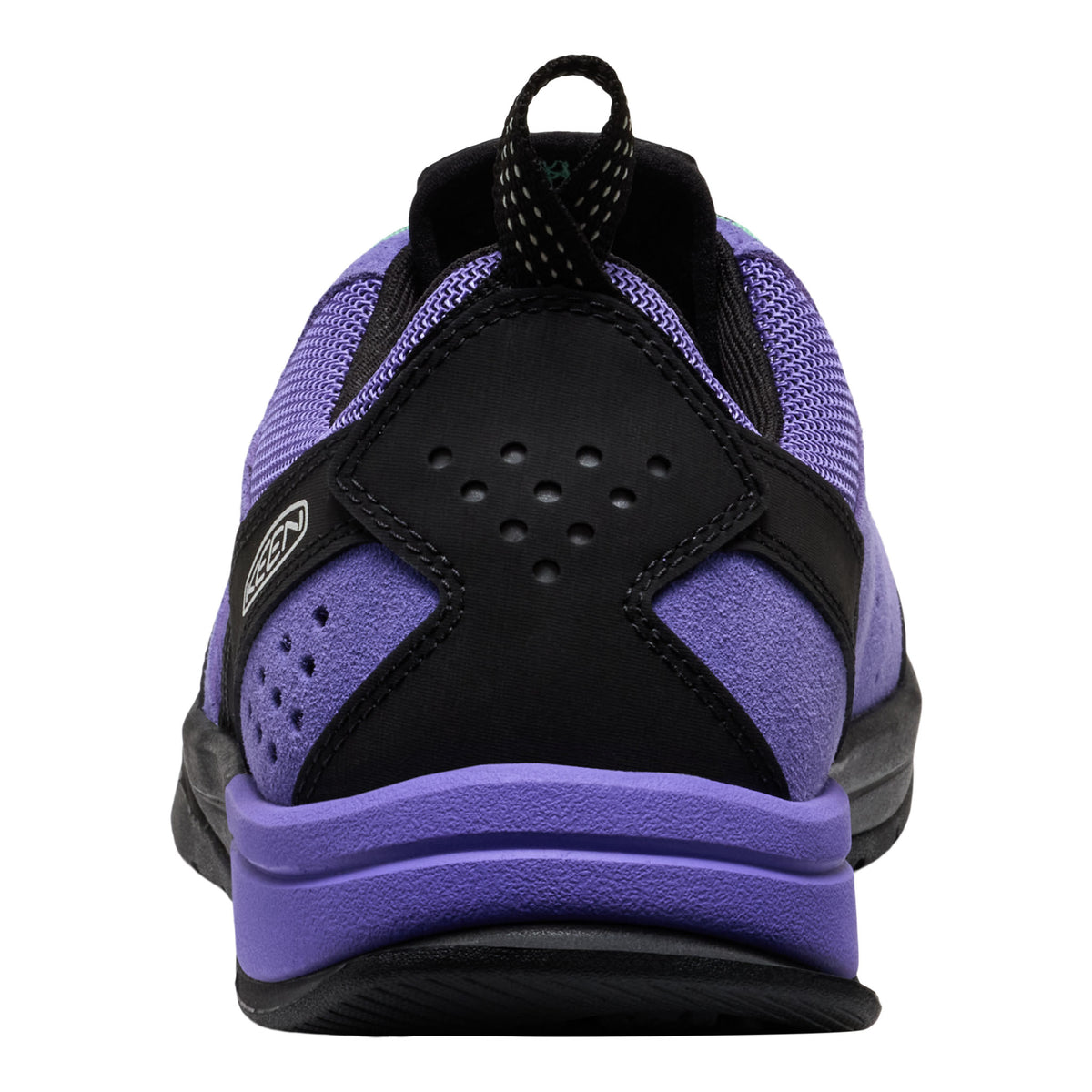 Black and purple athletic shoe on a white background
