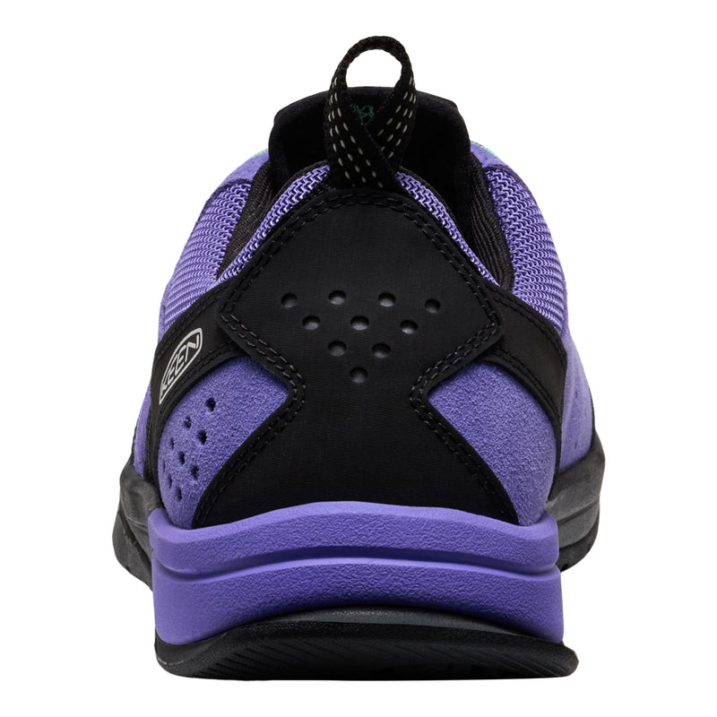 Black and purple athletic shoe on a white background