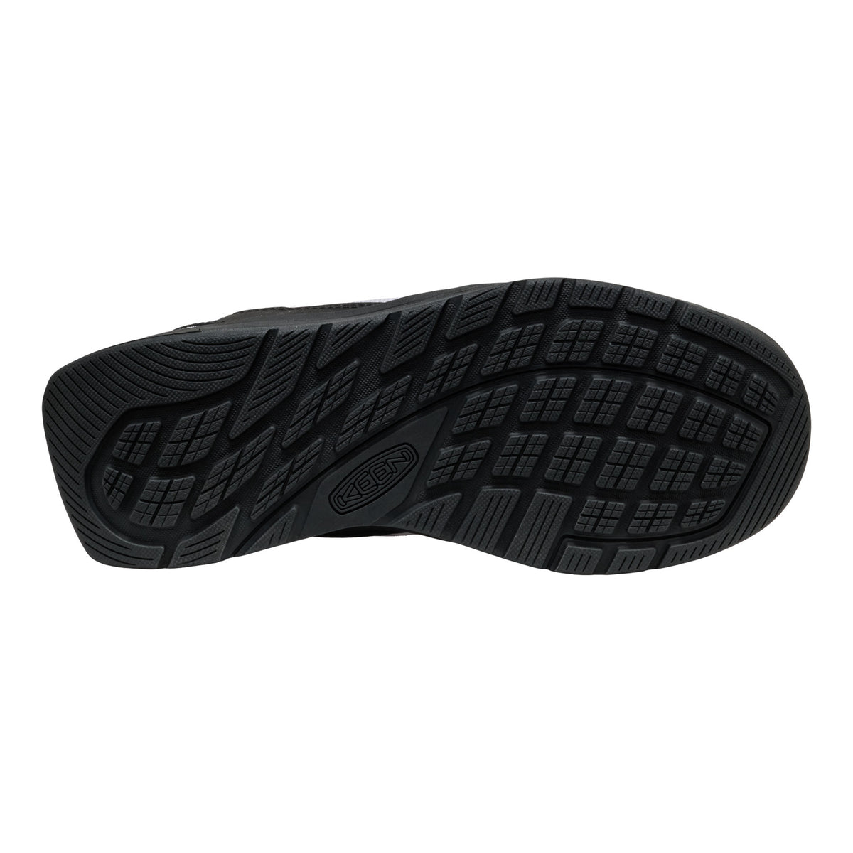 Black shoe sole with tread pattern on a white background